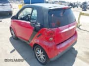 ✅ 2009 Smart fortwo Pure • VIN: WMEEJ31X89K247804 • Лот: 42998339. Опубликован ранее на IAAI с пробегом 126 234 миль. Бесплатный доступ к архиву аукционных продаж из США и подробный отчёт об истории автомобиля на DreamBid. Изображение 3.