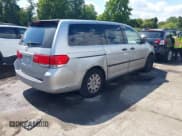 ✅ 2010 Honda Odyssey LX • VIN: 5FNRL3H27AB089980 • Лот: 43122698. Опубликован ранее на IAAI с пробегом 218 555 миль. Бесплатный доступ к архиву аукционных продаж из США и подробный отчёт об истории автомобиля на DreamBid. Изображение 4.