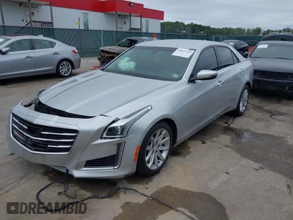 ✅ 2015 Cadillac CTS AWD • VIN: 1G6AW5SX3F0142431 • Lot: 43027413. Listed on IAAI with 125,276 mi. Free auction sales archive from the USA and detailed vehicle history report at DreamBid. Image 18.