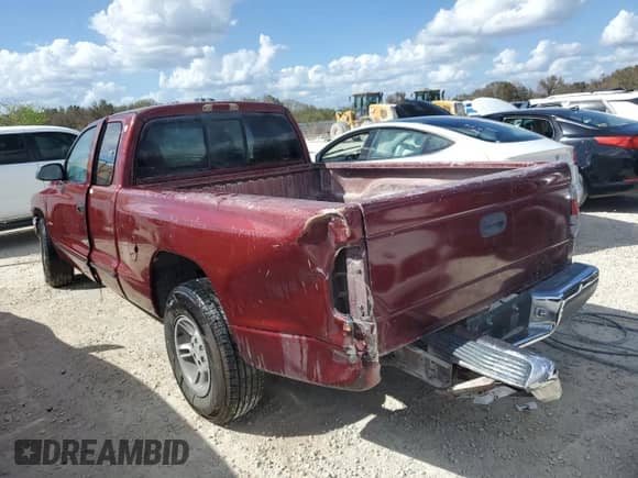 2000 Dodge Dakota Sport z VIN 1B7GL22N9YS602454, wystawiony jako Copart lot #78622624 z przebiegiem 108 355 mil mil oraz Szkoda całkowita • Salvage title. Historia ofert i sprzedaży dostępna na DreamBid. Obrazek 2.