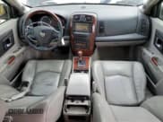 ✅ 2006 Cadillac SRX • VIN: 1GYEE63A760144999 • Лот: 87649445. Опубликован ранее на Copart с пробегом 85 765 миль. Бесплатный доступ к архиву аукционных продаж из США и подробный отчёт об истории автомобиля на DreamBid. Изображение 8.