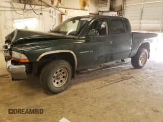2001 Dodge Dakota Sport with VIN 1B7HG2AZ51S306530, listed as a Copart auction lot 60946554 with Not provided miles and Clean title. Bid and sale history available at DreamBid. Image 1.