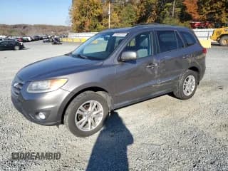 ✅ 2012 Hyundai Santa Fe SE • VIN: 5XYZH4AG4CG097771 • Лот: 91481515. Опубликован ранее на Copart с пробегом 144 888 миль. Бесплатный доступ к архиву аукционных продаж из США и подробный отчёт об истории автомобиля на DreamBid. Изображение 1.