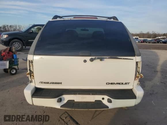 2003 Chevrolet Blazer LS z VIN 1GNCS18XX3K134514, wystawiony jako Copart lot #84811644 z przebiegiem 154 839 mil mil oraz Szkoda całkowita • Salvage title. Historia ofert i sprzedaży dostępna na DreamBid. Obrazek 6.