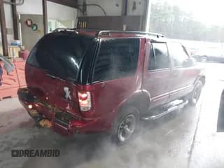 ✅ 2002 Chevrolet Blazer LS • VIN: 1GNCS13W82K137523 • Lot: 41533011. Wystawiony na IAAI z przebiegiem 87 229 mil. Bezpłatny archiwum sprzedaży aukcyjnych z USA i szczegółowy raport historii pojazdu na DreamBid. Zdjęcie 4.