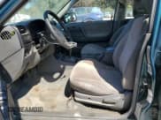 ✅ 1999 Isuzu Rodeo S • VIN: 4S2CM58W4X4330190 • Lot: 81996975. Wystawiony na Copart z przebiegiem 167 032 mil. Bezpłatny archiwum sprzedaży aukcyjnych z USA i szczegółowy raport historii pojazdu na DreamBid. Zdjęcie 7.