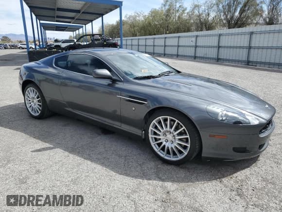 ✅ 2007 Aston Martin DB9 • VIN: SCFAD01A77GA07808 • Лот: 48063115. Опубликован ранее на Copart с пробегом 53 195 миль. Бесплатный доступ к архиву аукционных продаж из США и подробный отчёт об истории автомобиля на DreamBid. Изображение 4.