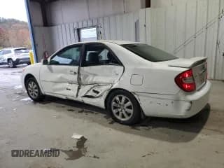 ✅ 2004 Toyota Camry LE • VIN: 4T1BE32K04U262525 • Lot: 90217255. Wystawiony na Copart z przebiegiem 305 513 mil. Bezpłatny archiwum sprzedaży aukcyjnych z USA i szczegółowy raport historii pojazdu na DreamBid. Zdjęcie 2.