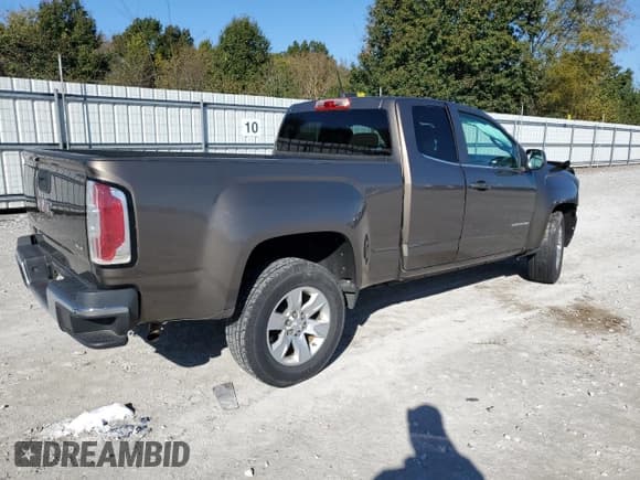 ✅ 2015 GMC Canyon 2WD SLE • VIN: 1GTH5BEA7F1144066 • Lot: 90898695. Listed on Copart with 111,679 mi. Free auction sales archive from the USA and detailed vehicle history report at DreamBid. Image 3.