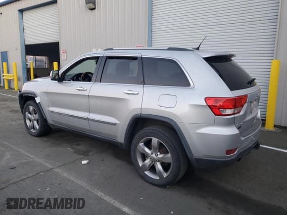 ✅ 2012 Jeep Grand Cherokee Overland • VIN: 1C4RJFCT8CC332736 • Lot: 87726165. Listed on Copart with 151,711 mi. Free auction sales archive from the USA and detailed vehicle history report at DreamBid. Image 2.