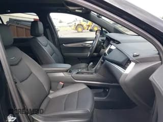 ✅ 2024 Cadillac XT6 FWD Luxury • VIN: 1GYKPAR41RZ734634 • Lot: 42254620. Listed on IAAI with 8,883 mi. Free auction sales archive from the USA and detailed vehicle history report at DreamBid. Image 5.