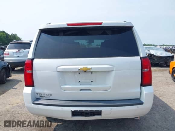 2019 Chevrolet Tahoe LT z VIN 1GNSKBKC5KR153517, wystawiony jako IAAI lot #42390642 z przebiegiem 52 034 mil mil oraz . Historia ofert i sprzedaży dostępna na DreamBid. Obrazek 16.