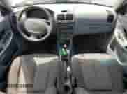 2004 Hyundai Accent GL z VIN KMHCG45C94U574027, wystawiony jako Copart lot #57463905 z przebiegiem 139 595 mil mil oraz Szkoda całkowita • Salvage title. Historia ofert i sprzedaży dostępna na DreamBid. Obrazek 8.