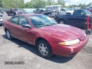 ✅ 2002 Oldsmobile Alero GL1 • VIN: 1G3NL52F52C301358 • Лот: 43064600. Опубликован ранее на IAAI с пробегом 164 000 миль. Бесплатный доступ к архиву аукционных продаж из США и подробный отчёт об истории автомобиля на DreamBid. Изображение 1.