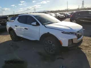 2024 Hyundai Santa Cruz SEL z VIN 5NTJB4DE8RH113577, wystawiony jako Copart lot #76414904 z przebiegiem 8 927 mil mil oraz Szkoda całkowita • Salvage title. Historia ofert i sprzedaży dostępna na DreamBid. Obrazek 4.