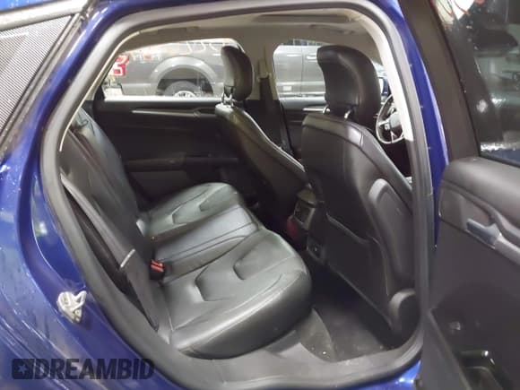 ✅ 2014 Ford Fusion Titanium Hybrid • VIN: 3FA6P0RU6ER175894 • Lot: 43220307. Listed on IAAI with 157,170 mi. Free auction sales archive from the USA and detailed vehicle history report at DreamBid. Image 8.