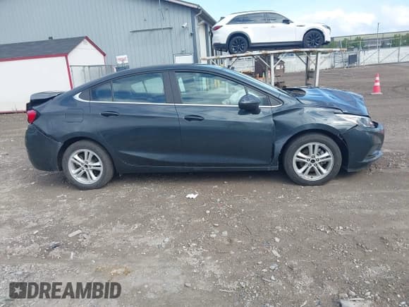 ✅ 2018 Chevrolet Cruze LT • VIN: 1G1BE5SM0J7209778 • Лот: 43290097. Опубликован ранее на IAAI с пробегом 47 625 миль. Бесплатный доступ к архиву аукционных продаж из США и подробный отчёт об истории автомобиля на DreamBid. Изображение 13.