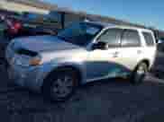 2010 Mercury Mariner z VIN 4M2CN8B73AKJ15604, wystawiony jako IAAI lot #41454647 z przebiegiem 170 761 mil mil oraz . Historia ofert i sprzedaży dostępna na DreamBid. Obrazek 2.