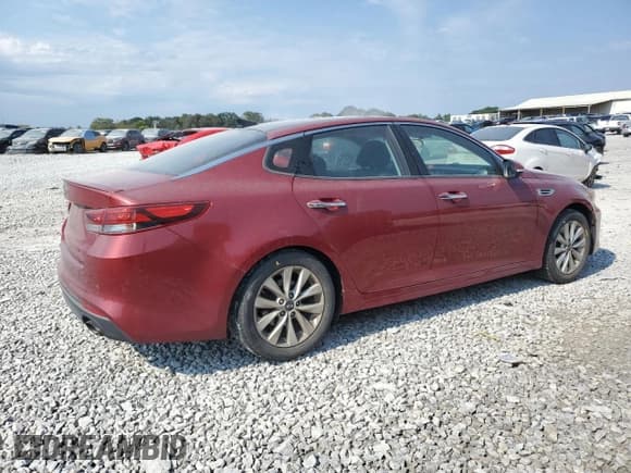 ✅ 2018 Kia Optima S • VIN: 5XXGT4L3XJG240563 • Lot: 80871225. Listed on Copart with 104,957 mi. Free auction sales archive from the USA and detailed vehicle history report at DreamBid. Image 3.