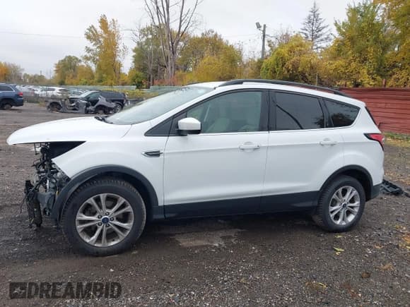 ✅ 2018 Ford Escape SE • VIN: 1FMCU0GD9JUC32631 • Lot: 43648621. Listed on IAAI with 86,643 mi. Free auction sales archive from the USA and detailed vehicle history report at DreamBid. Image 15.