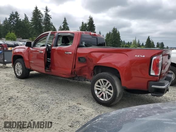 ✅ 2015 GMC Canyon 4WD SLT • VIN: 1GTG6CE39F1270042 • Lot: 60497565. Listed on Copart with 33,714 mi. Free auction sales archive from the USA and detailed vehicle history report at DreamBid. Image 2.