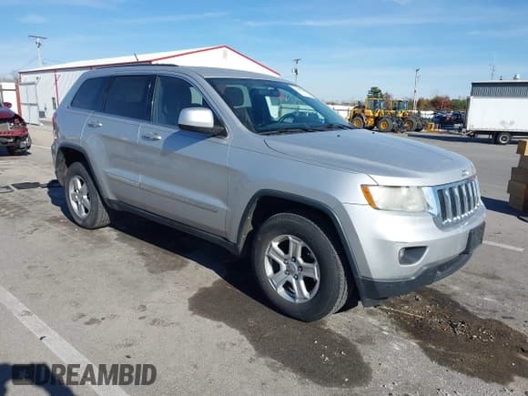 ✅ 2013 Jeep Grand Cherokee Laredo • VIN: 1C4RJFAG8DC607593 • Lot: 43643452. Listed on IAAI with 168,356 mi. Free auction sales archive from the USA and detailed vehicle history report at DreamBid. Image 1.