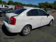 2010 Hyundai Accent GLS with VIN KMHCN4AC0AU494560, listed as a Copart auction lot 90856845 with 123,645 mi miles and Salvage title. Bid and sale history available at DreamBid. Image 3.