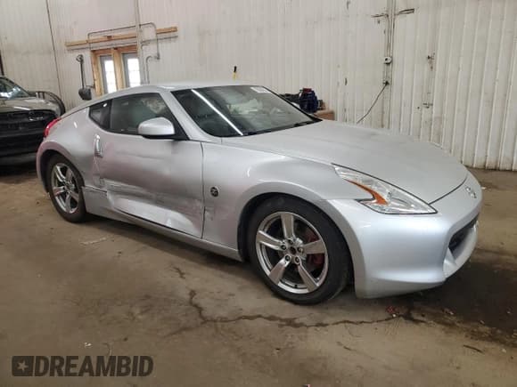 ✅ 2009 Nissan 370Z Touring • VIN: JN1AZ44E59M405514 • Лот: 70064235. Опубликован ранее на Copart с пробегом 198 510 миль. Бесплатный доступ к архиву аукционных продаж из США и подробный отчёт об истории автомобиля на DreamBid. Изображение 4.