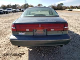 ✅ 1995 Lincoln Continental • VIN: 1LNLM97V0SY745547 • Lot: 93216315. Wystawiony na Copart z przebiegiem 97 068 mil. Bezpłatny archiwum sprzedaży aukcyjnych z USA i szczegółowy raport historii pojazdu na DreamBid. Zdjęcie 6.