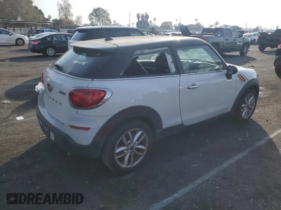 ✅ 2014 MINI Paceman • VIN: WMWSS1C57EWN94457 • Лот: 42485555. Опубликован ранее на Copart с пробегом 104 837 миль. Бесплатный доступ к архиву аукционных продаж из США и подробный отчёт об истории автомобиля на DreamBid. Изображение 4.