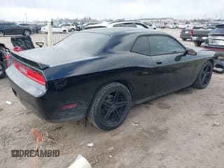 ✅ 2014 Dodge Challenger SXT • VIN: 2C3CDYAG7EH285802 • Lot: 41509045. Wystawiony na IAAI z przebiegiem 139 855 mil. Bezpłatny archiwum sprzedaży aukcyjnych z USA i szczegółowy raport historii pojazdu na DreamBid. Zdjęcie 4.