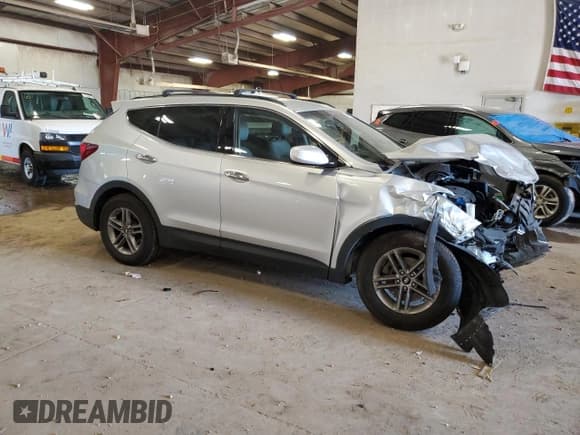 ✅ 2017 Hyundai Santa Fe 2.4L • VIN: 5XYZUDLB6HG414423 • Lot: 57121705. Wystawiony na Copart z przebiegiem 145 520 mil. Bezpłatny archiwum sprzedaży aukcyjnych z USA i szczegółowy raport historii pojazdu na DreamBid. Zdjęcie 4.