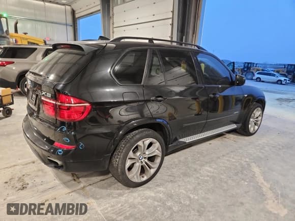 ✅ 2012 BMW X5 50i • VIN: 5UXZV8C51CL424965 • Лот: 93650355. Опубликован ранее на Copart с пробегом 121 895 миль. Бесплатный доступ к архиву аукционных продаж из США и подробный отчёт об истории автомобиля на DreamBid. Изображение 3.