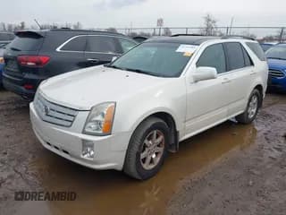 ✅ 2009 Cadillac SRX AWD • VIN: 1GYEE437190116645 • Lot: 43703488. Wystawiony na IAAI z przebiegiem 155 234 mil. Bezpłatny archiwum sprzedaży aukcyjnych z USA i szczegółowy raport historii pojazdu na DreamBid. Zdjęcie 2.