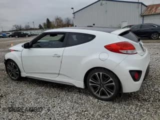 ✅ 2016 Hyundai Veloster Turbo • VIN: KMHTC6AE8GU286552 • Lot: 80307554. Wystawiony na Copart z przebiegiem 102 997 mil. Bezpłatny archiwum sprzedaży aukcyjnych z USA i szczegółowy raport historii pojazdu na DreamBid. Zdjęcie 2.