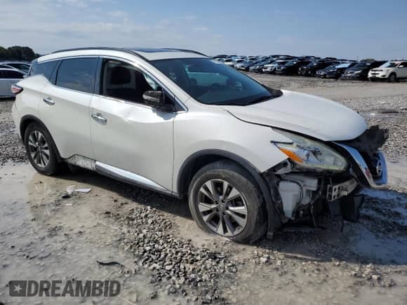 2016 Nissan Murano S with VIN 5N1AZ2MG0GN103263, listed as a Copart auction lot 71057085 with 164,579 mi miles and Salvage title. Bid and sale history available at DreamBid. Image 4.