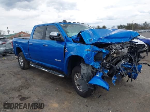 ✅ 2021 Ram 2500 Laramie • VIN: 3C6UR5FLXMG585099 • Lot: 41642082. Listed on IAAI with 43,604 mi. Free auction sales archive from the USA and detailed vehicle history report at DreamBid. Image 1.