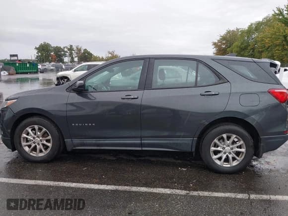 ✅ 2018 Chevrolet Equinox LS • VIN: 3GNAXHEV6JS557046 • Lot: 43391209. Wystawiony na IAAI z przebiegiem 128 769 mil. Bezpłatny archiwum sprzedaży aukcyjnych z USA i szczegółowy raport historii pojazdu na DreamBid. Zdjęcie 14.