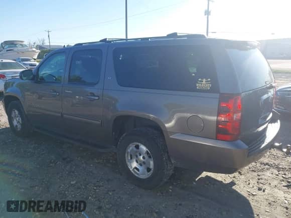 2014 Chevrolet Suburban LT z VIN 1GNSKJE76ER214080, wystawiony jako IAAI lot #42766041 z przebiegiem 204 832 mil mil oraz . Historia ofert i sprzedaży dostępna na DreamBid. Obrazek 3.