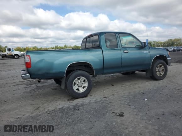 ✅ 1997 Toyota T100 SR5 • VIN: JT4UN24D9V0041794 • Lot: 81197325. Listed on Copart with 196,781 mi. Free auction sales archive from the USA and detailed vehicle history report at DreamBid. Image 3.