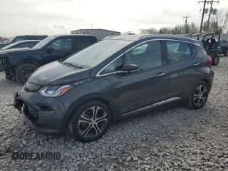 ✅ 2018 Chevrolet Bolt EV Premier • VIN: 1G1FX6S04J4112051 • Lot: 54601385. Wystawiony na Copart z przebiegiem Nie podano. Bezpłatny archiwum sprzedaży aukcyjnych z USA i szczegółowy raport historii pojazdu na DreamBid. Zdjęcie 1.