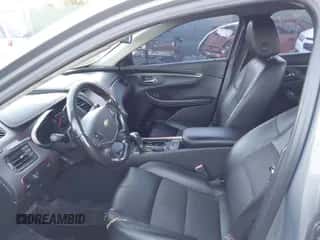 2018 Chevrolet Impala LT z VIN 1G1105S31JU108736, wystawiony jako IAAI lot #43478113 z przebiegiem 134 000 mil mil oraz . Historia ofert i sprzedaży dostępna na DreamBid. Obrazek 5.