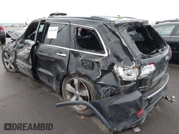 ✅ 2015 Jeep Grand Cherokee Overland • VIN: 1C4RJFCG3FC665854 • Lot: 41697999. Listed on IAAI with 206,618 mi. Free auction sales archive from the USA and detailed vehicle history report at DreamBid. Image 3.