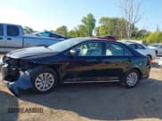 ✅ 2014 Toyota Camry XLE • VIN: 4T1BF1FK9EU461361 • Lot: 43409800. Listed on IAAI with 257,240 mi. Free auction sales archive from the USA and detailed vehicle history report at DreamBid. Image 14.