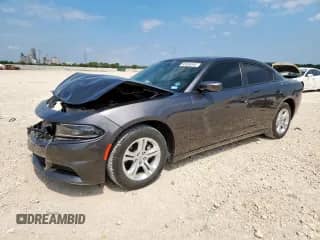 2022 Dodge Charger SXT with VIN 2C3CDXBG2NH224267, listed as a Copart auction lot 80954845 with 51,100 mi miles and Salvage title. Bid and sale history available at DreamBid. Image 1.