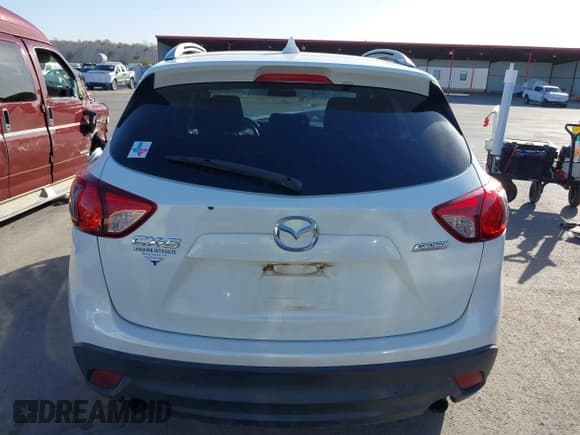 ✅ 2015 Mazda CX-5 Sport • VIN: JM3KE2BE3F0449722 • Лот: 41825810. Опубликован ранее на IAAI с пробегом 181 949 миль. Бесплатный доступ к архиву аукционных продаж из США и подробный отчёт об истории автомобиля на DreamBid. Изображение 17.