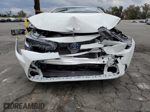 ✅ 2025 Toyota Corolla Hybrid LE • VIN: JTDBCMFE7S3070798 • Лот: 81526655. Опубликован ранее на Copart с пробегом 22 945 миль. Бесплатный доступ к архиву аукционных продаж из США и подробный отчёт об истории автомобиля на DreamBid. Изображение 5.