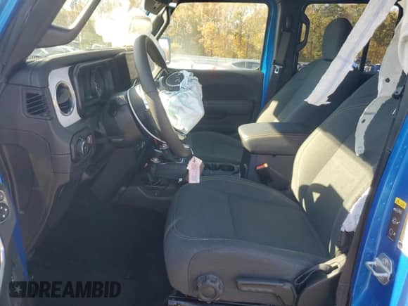 2025 Jeep Wrangler Sahara with VIN 1C4PJXENXSW526841, listed as a Copart auction lot 91047595 with 16,543 mi miles and Clean title. Bid and sale history available at DreamBid. Image 7.