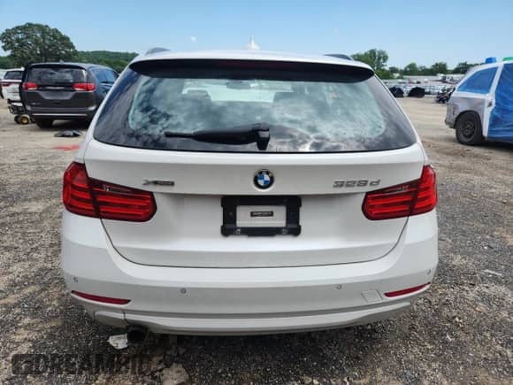 2015 BMW 3 Series 328d xDrive with VIN WBA3K5C54FK301943, listed as a Copart auction lot 61622275 with 57,648 mi miles and Non repairable. Bid and sale history available at DreamBid. Image 6.