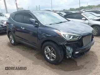 2017 Hyundai Santa Fe 2.4L z VIN 5NMZU3LB2HH022667, wystawiony jako IAAI lot #42723344 z przebiegiem 93 174 mil mil oraz . Historia ofert i sprzedaży dostępna na DreamBid. Obrazek 1.